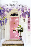 This floral doorway scene could easily belong to a tucked-away Fitzrovia mews, where period architecture and modern life meet in a gentle, stylish blend. At its centre stands a pink-painted front door, the hue soft and sophisticated rather than bright, its smooth panels glowing faintly in the ambient daylight. It is framed above and to the side by cascades of wisteria in shades of lavender and pale purple, the blossoms hanging in long, clustered trails that sway with an imagined breeze from nearby Cavendish Square. The wall surrounding the door is whitewashed, clean and lightly textured, reflecting the light in a way that enhances the pastel tones without overpowering them. A matching shutter, painted to echo the blush of the door, helps to anchor the composition, offering balance and an almost painterly symmetry. At the threshold, as though just placed there by a florist after weaving through Fitzrovia's narrow streets, sits a simple grey metal bucket overflowing with creamy white roses. The roses are abundant and open, their petals layered and curved, catching the light in soft gradients from ivory to warm cream. Intertwined among them are stems of subtle green foliage, adding gentle contrast and a touch of wildness to the otherwise composed arrangement. Around the base of the bucket, a satin ribbon in pale pink is tied in a tidy bow, its sheen catching the eye and providing a final, graceful detail. The overall mood is warm, hopeful, and quietly celebratory-a perfect visual for a housewarming gesture, a congratulations message on securing a new Fitzrovia address, or simply a reminder that even in the heart of central London, a front step can be transformed into a small, personal sanctuary of beauty and welcome.